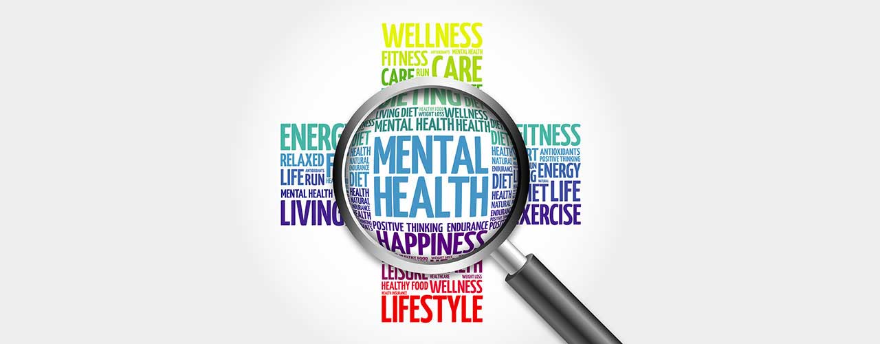 Magnifying glass over the words mental health