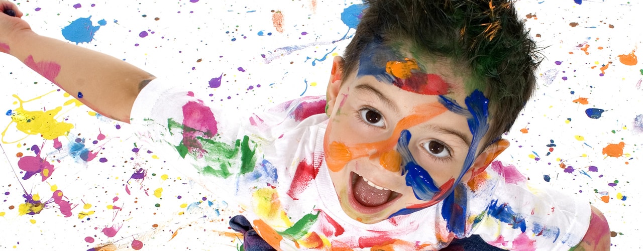Child covered in paint